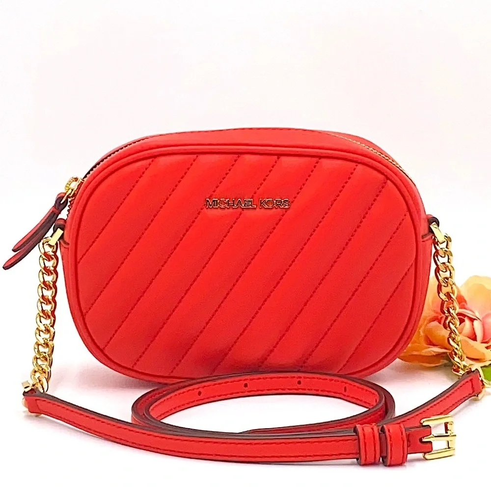 MICHAEL KORS ROSE SM OVAL CAMERA XBODY DR SANGRIA